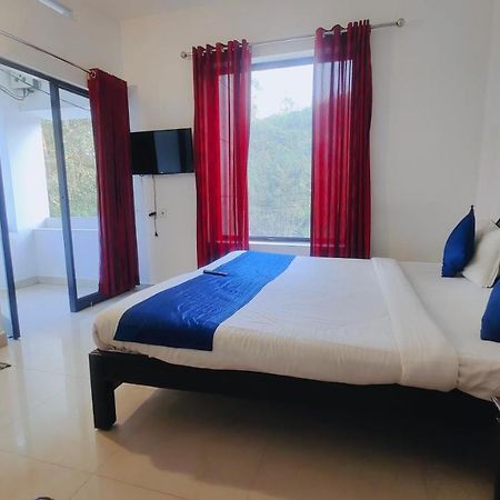 Lumino Karthika Hotel Munnar Bagian luar foto