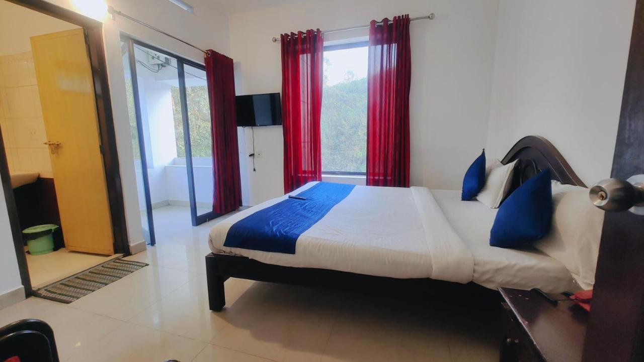 Lumino Karthika Hotel Munnar Bagian luar foto